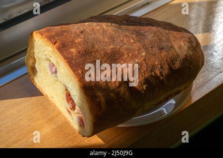 Traditional Portuguese Easter bread with chorizo ​​and bacon typical of Trás os Montes, Montalegre know as Folar da Páscoa. Portuguese tapas. Stock Photo