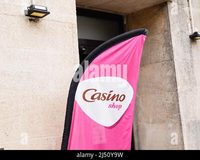 Bordeaux , Aquitaine  France - 03 20 2022 : Casino shop supermarket logo brand and text pink flag sign front of store city entrance Stock Photo