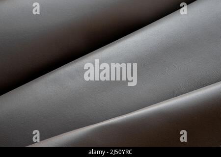 Close up background of taupe soft nappa leather. Stock Photo