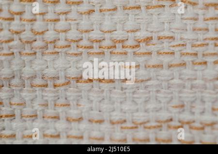 Texture of white and brown fabric.  White and brown woven into a tablecloth. Abstract multitasking background. Macro shot. Stock Photo