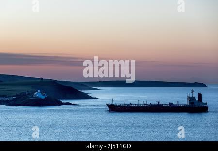 Cork Harbour, Cork, Ireland. 19th April, 2022. Tanker Grande Riviere approaches Roches Point at dawn with a cargo of Methanol bound for offloading at the Belvelly Port Facility in Cork Harbour, Cork, Ireland. - Credit; David Creedon / Alamy Live News Stock Photo