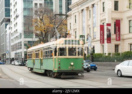 The City Circle tram on a cold Winters day in Melbourne Central, going past the Immigration Museum. Stock Photo