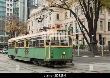 The City Circle tram on a cold Winters day in Melbourne Central, going past the Immigration Museum. Stock Photo