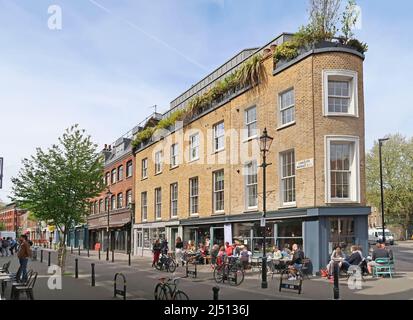 Exmouth Market, London Brough of Islington, UK. A famous pedestrianised street - home to cafes and street market. Shown on a quiet spring bank-holiday Stock Photo