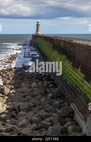 Tynemouth North Pier and Lighthouse at the mouth of the River Tyne,Taken on a sunny spring day. Stock Photo