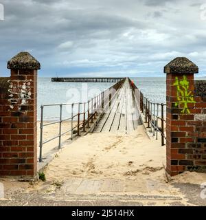 Entrance to the old wooden south pier at the port of Blyth in Northumberland, England. Stock Photo