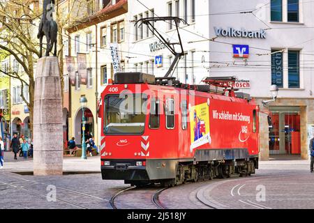 Freiburg, Germany - April 2022: Rail grinder vehicle on streetcar tracks in city center Stock Photo