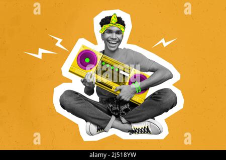 Composite drawing illustration of man sitting hold radio boombox enjoy music isolated on yellow background Stock Photo