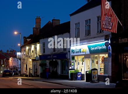 Morrisons Daily shop on the high street, at dusk, Market Weighton, East Yorkshire, England UK Stock Photo