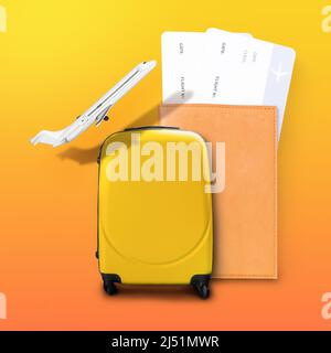 Suitcase And Airplane Near Passport Tickets Standing Over Orange Background Stock Photo