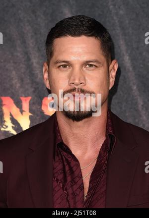 JD Pardo walking on the red carpet at FX's "Mayans M.C." season 4