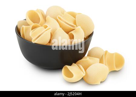 lumaconi pasta in ceramic bowl isolated on white background with clipping path and full depth of field Stock Photo