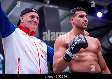 London, England - APRIL 19: Tommy Fury hits pads with his father, John Fury during the Open Workout prior to Fury vs Whyte for the WBC Heavyweight Title on April 23, 2022 at Wembley Stadium in London, England, United Kingdom. (Photo by Matt Davies/PxImages) Credit: Px Images/Alamy Live News Stock Photo