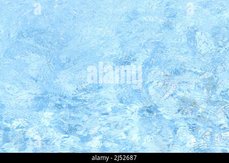 Blue waving, sparkling water in the pool. Abstract background. Graphic resources Stock Photo