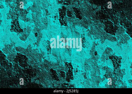 Cyan color dirty concrete wall surface with rugged black grunge texture for background Stock Photo