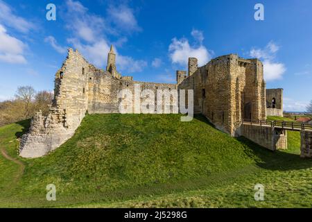 The bridge and entrance gate to Warkworth Castle, Northumberland, England Stock Photo