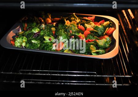 Fried vegetables broccoli pepper and bean in the oven, healthy eating 