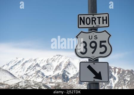 US Route 395 sign with Eastern Sierra Mountain backdrop, Mono County, California, USA Stock Photo