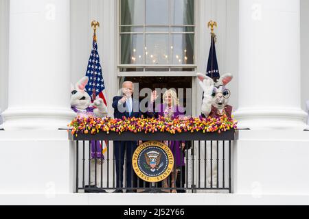Washington, United States Of America. 19th Apr, 2022. Washington, United States of America. 19 April, 2022. U.S President Joe Biden, First Lady Jill Biden and the Easter Bunnies wave at the start of the annual Easter Egg Roll from the Blue Room balcony of the White House, April 18, 2022 in Washington, DC The annual event returned to the White House following a two-year hiatus due to the pandemic. Credit: Adam Schultz/White House Photo/Alamy Live News Stock Photo