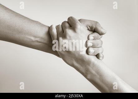 Giving a helping hand, support and assistance concept Stock Photo