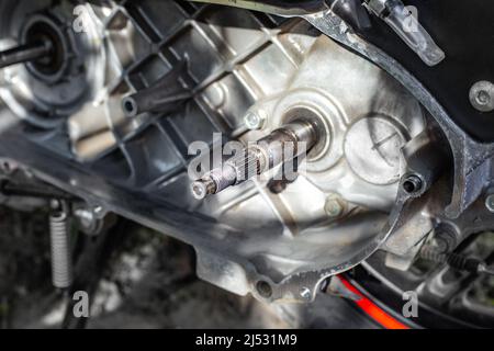 Open CVT case with scooter rear wheel drive. Repair and maintenance of motorcycles. Stock Photo