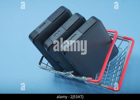 A stack of hard drives in a basket. Stock Photo