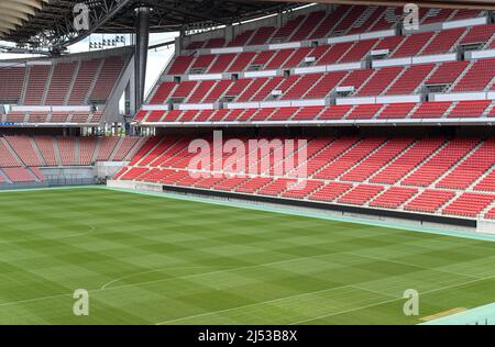 Empty seats and green field at the Toyota Stadium in Japan. Stock Photo