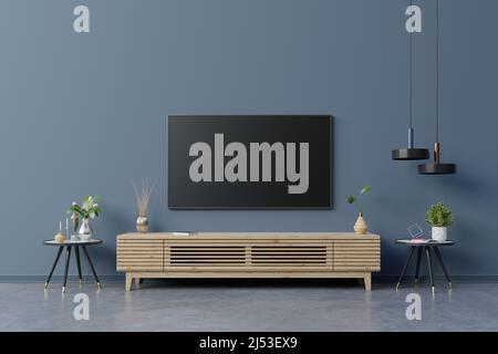 LED TV on the dark blue wall in living room,minimal design.3d rendering Stock Photo