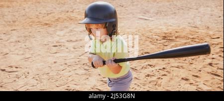 Excited child baseball player focused ready to bat. Kid holding a baseball  bat Stock Photo - Alamy