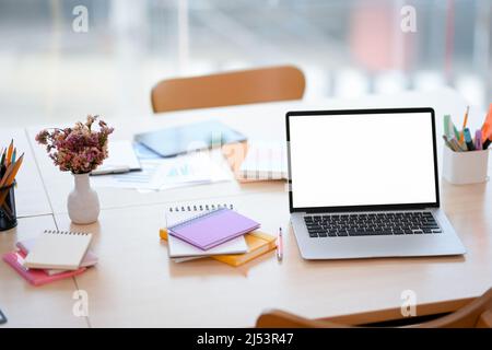 Working With Laptop At Worktable On White Blurred Background Stock 