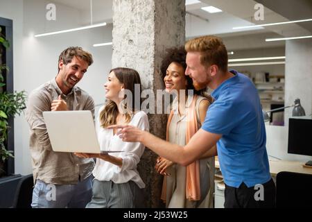 Group of happy friendly multiethnic business people having fun, working together in office Stock Photo