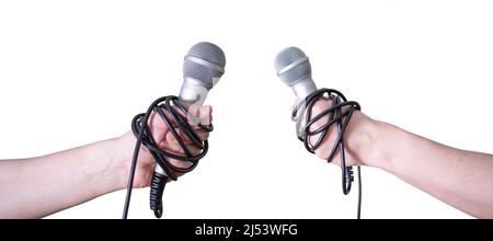 People holding different microphones on white background, closeup. The concept of World Press Freedom Day. Stock Photo