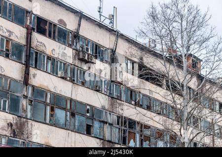 Kutaisi, Georgia - March 18, 2022: Detail of ruined building with broken windows. Stock Photo