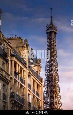 Paris, France - December 11, 2021: Nice view of Eiffel tower with Haussmann building in Paris Stock Photo