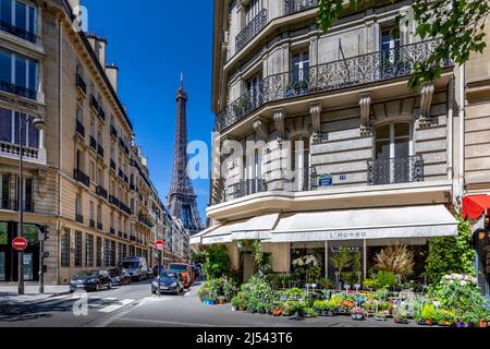 Paris, France - May 27, 2021: Eiffel tower between haussman buildings in Paris Stock Photo