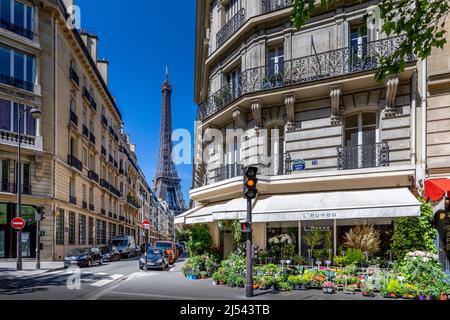 Paris, France - May 27, 2021: Eiffel tower between haussman buildings in Paris Stock Photo