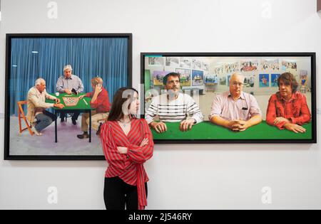 Business Design Centre, Islington, London, UK. 20 April 2022. The 34th edition of the London Art Fair features over 100 selected galleries celebrating the best in Modern and Contemporary Art to discover and buy, from 21-24 April. Image (right): David Hockney, JP, JM, JW in the Studio, 2015, Fairhead Fine Art. Credit: Malcolm Park/Alamy Live News. Stock Photo