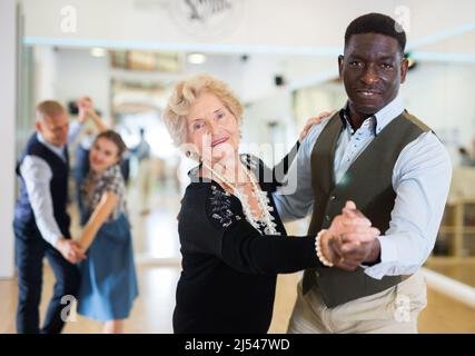 Two professional dancers practicing lindy hop in dance class Stock Photo