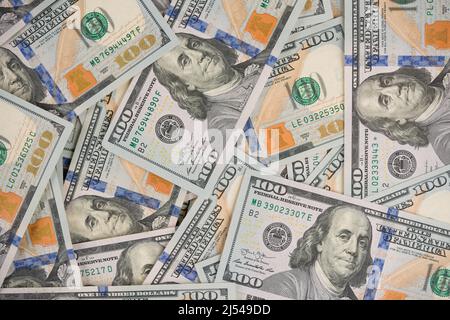 Financial background made with one hundred dollars banknotes. Financial growth and business concept. Cash money background. Investments market Stock Photo
