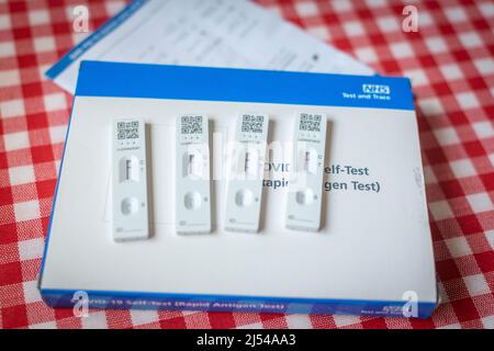 Coronavirus (COVID-19) rapid lateral flow tests at home, three negative and positive results, UK Stock Photo