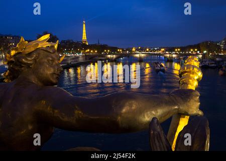 Twilight over statue on Pont Alexandre III with River Seine and Eiffel Tower, Paris, France, Europe Stock Photo