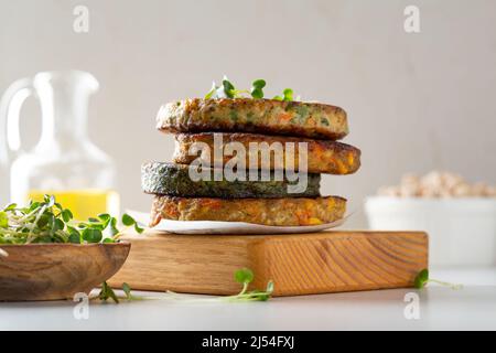 Stack of vegan nut, lentils and vegetables pancakes food Stock Photo