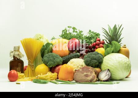 Fresh vegetables and fruits on a white background. Wide panoramic set of ripe, juicy fruits and vegetables on a white background Stock Photo