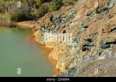 Green Terranera sulfuric lake, Elba Island, Italy Stock Photo