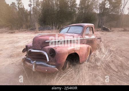 Abandoned rusted old truck in field in rural Ontario, Canada Stock Photo