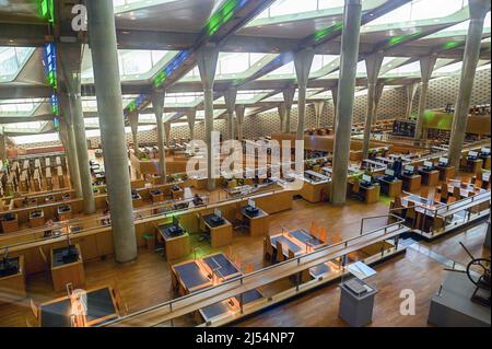 CAIRO, April 20, 2022 (Xinhua) -- Photo shows a view of the interior of the Bibliotheca Alexandrina in Alexandria, Egypt on April 19, 2022. Bibliotheca Alexandrina, a massive unique library and cultural symbol of the Egyptian Mediterranean coastal city of Alexandria which was founded by King Alexander the Great some 2,300 years ago, features a disc-shaped exterior and 11 internal levels, all under one glistening, tilting roof. The iconic library was inaugurated in 2002 as a revival of the original ancient Library of Alexandria, which was one of the largest and most significant l Stock Photo