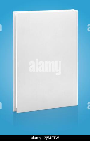 A Blank White Book Hard Cover on Blue Background Stock Photo