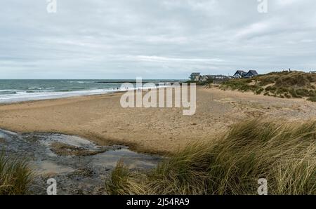 View of Treath Llydan beach at Rhosneigr, Anglesey, North Wales, UK. Taken on 5th April 2022. Stock Photo