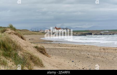 View of Treath Llydan beach at Rhosneigr, Anglesey, North Wales, UK. Taken on 5th April 2022. Stock Photo