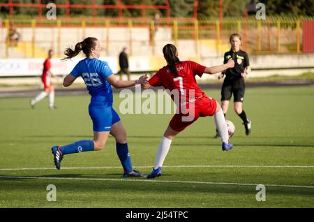 Women football, a tough duel between player Stock Photo